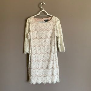 Cream lace dress with mid sleeves. Size 6